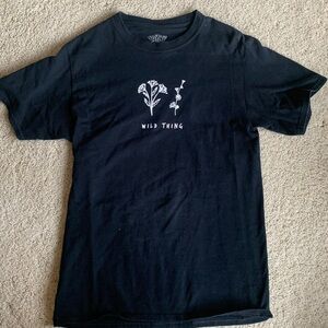 Black floral Serengetee t-shirt that says Wild Thing